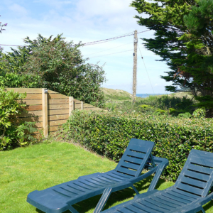 Back garden sun loungers and sea view