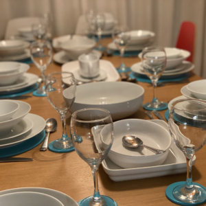 Dining table, chairs, crockery, cutlery and placemats for 10 people